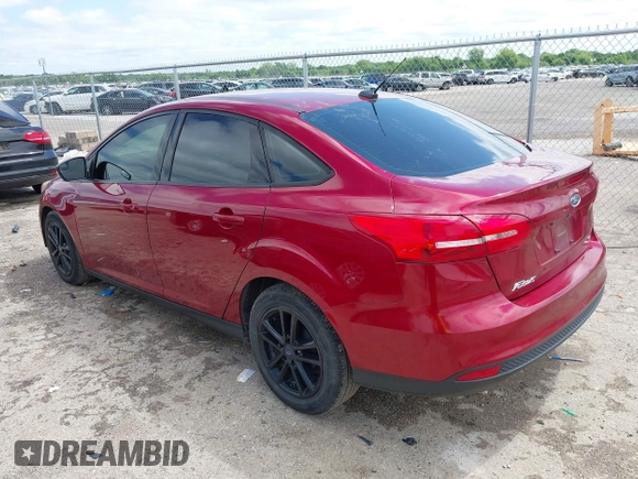 2017 Ford Focus SE z VIN 1FADP3F23HL313857, wystawiony jako IAAI lot #42181530 z przebiegiem 93 478 mil mil oraz . Historia ofert i sprzedaży dostępna na DreamBid. Obrazek 3.