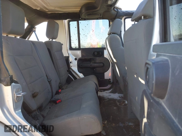 2008 Jeep Wrangler Unlimited Sahara with VIN 1J4GA59108L512527, listed as a IAAI auction lot 41625750 with 176,027 mi miles and . Bid and sale history available at DreamBid. Image 8.