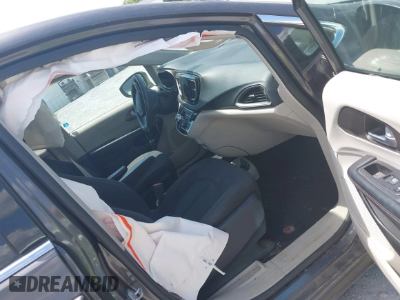 2017 Chrysler Pacifica Touring with VIN 2C4RC1DG4HR770716, listed as a IAAI auction lot 42647418 with 75,958 mi miles and . Bid and sale history available at DreamBid. Image 5.