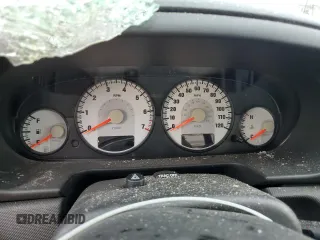 2004 Dodge Stratus SE z VIN 1B3EL36T44N370474, wystawiony jako Copart lot #58523945 z przebiegiem Nie podano mil oraz Szkoda całkowita • Salvage title. Historia ofert i sprzedaży dostępna na DreamBid. Obrazek 9.