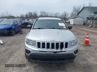 2012 Jeep Compass Sport with VIN 1C4NJDBB4CD624163, listed as a IAAI auction lot 42025783 with 148,928 mi miles. Bid and sale history available at carsss.com. Image 12.