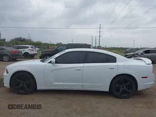 2014 Dodge Charger SXT with VIN 2C3CDXHG1EH122157, listed as a IAAI auction lot 41693517 with 191,095 mi miles and . Bid and sale history available at carsss.com. Image 13.