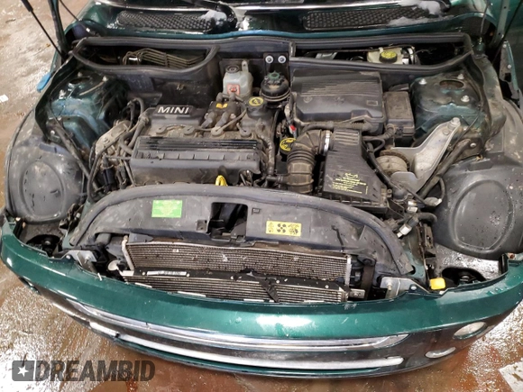 2006 MINI Convertible z VIN WMWRF33596TF64235, wystawiony jako Copart lot #43614735 z przebiegiem 138 541 mil mil oraz Czysty tytuł • Clean title. Historia ofert i sprzedaży dostępna na DreamBid. Obrazek 13.