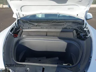 2024 Tesla Model Y Long Range with VIN 7SAYGDEE1RF056816, listed as a IAAI auction lot 41809125 with 6,434 mi miles and . Bid and sale history available at DreamBid. Image 10.