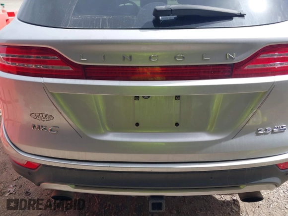 2015 Lincoln MKC with VIN 5LMTJ2AH8FUJ23341, listed as a IAAI auction lot 41828159 with 103,562 mi miles. Bid and sale history available at carsss.com. Image 3.
