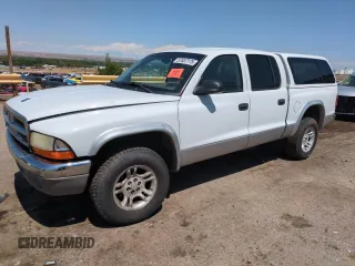 2004 Dodge Dakota SLT with VIN 1D7HG48N94S601137, listed as a Copart auction lot 57637175 with 247,362 mi miles and Salvage title. Bid and sale history available at DreamBid. Image 1.