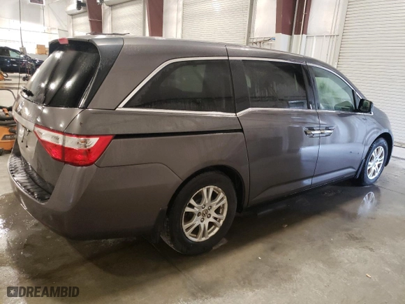 2012 Honda Odyssey EX-L with VIN 5FNRL5H66CB080110, listed as a Copart auction lot 53031925 with 143,657 mi miles and Salvage Title. Bid and sale history available at carsss.com. Image 3.
