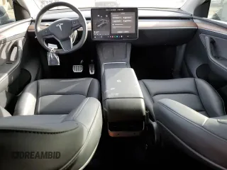 2024 Tesla Model Y with VIN 7SAYGDED5RF105278, listed as a Copart auction lot 44376125 with 12,693 mi miles and Salvage Title. Bid and sale history available at DreamBid. Image 8.