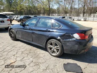 2015 BMW 4 Series 428i xDrive with VIN WBA4A7C58FD413734, listed as a Copart auction lot 50252325 with 74,629 mi miles and Salvage title. Bid and sale history available at DreamBid. Image 2.
