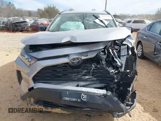 2021 Toyota RAV4 Hybrid LE z VIN JTMLWRFV8MD129136, wystawiony jako IAAI lot #41644636 z przebiegiem 82 253 mil mil oraz . Historia ofert i sprzedaży dostępna na DreamBid. Obrazek 6.