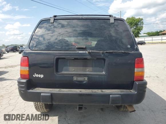 1998 Jeep Grand Cherokee Laredo with VIN 1J4GZ48S7WC222845, listed as a Copart auction lot 59576115 with Not provided miles and Clean title. Bid and sale history available at DreamBid. Image 6.