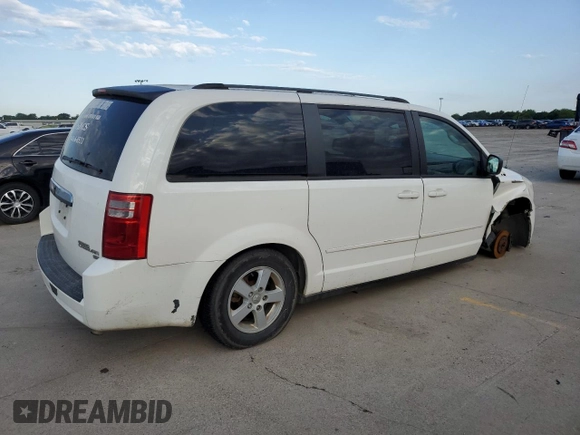 2010 Dodge Grand Caravan SE with VIN 2D4RN4DE9AR237795, listed as a Copart auction lot 55561025 with 212,109 mi miles and Clean Title. Bid and sale history available at DreamBid. Image 3.