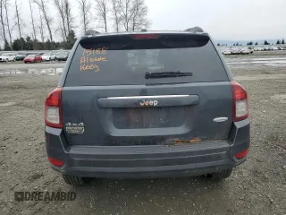 2014 Jeep Compass Latitude with VIN 1C4NJDEB4ED601769, listed as a Copart auction lot 48901365 with 129,826 mi miles and Salvage Title. Bid and sale history available at carsss.com. Image 6.
