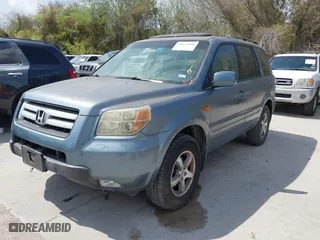 2007 Honda Pilot EX-L with VIN 5FNYF28597B037850, listed as a IAAI auction lot 41879048 with 194,089 mi miles. Bid and sale history available at carsss.com. Image 2.