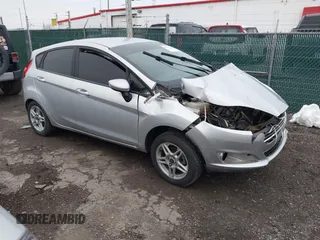 2017 Ford Fiesta SE with VIN 3FADP4EJ5HM104763, listed as a IAAI auction lot 42009697 with 117,980 mi miles. Bid and sale history available at carsss.com. Image 1.