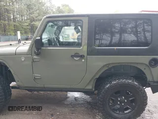 2007 Jeep Wrangler X with VIN 1J4FA24127L231409, listed as a IAAI auction lot 41971429 with 181,855 mi miles and . Bid and sale history available at carsss.com. Image 14.