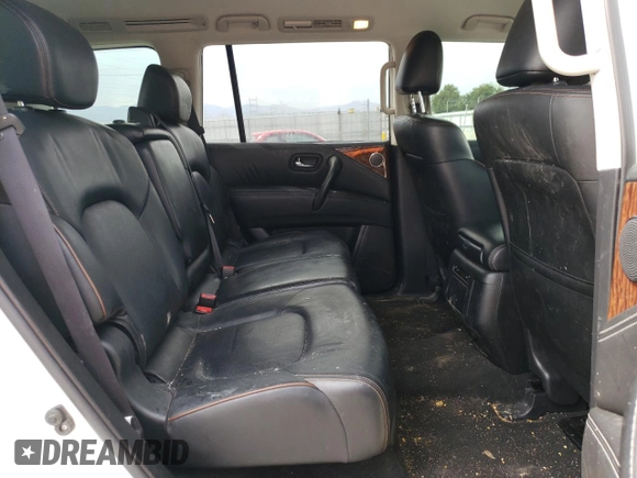 2017 Nissan Armada SV z VIN JN8AY2NC3H9504002, wystawiony jako Copart lot #54326965 z przebiegiem 86 469 mil mil oraz Szkoda całkowita • Salvage title. Historia ofert i sprzedaży dostępna na DreamBid. Obrazek 11.