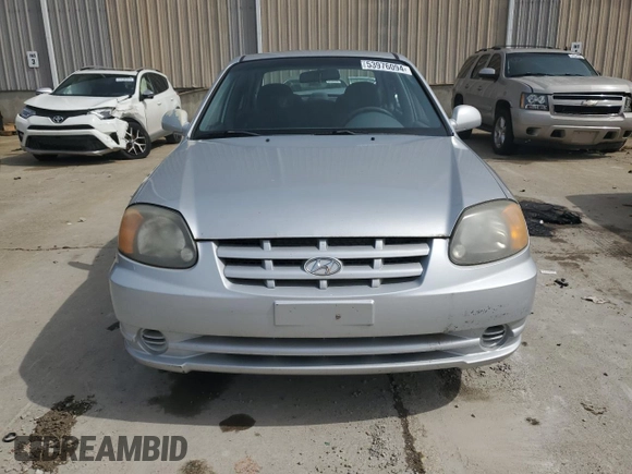 2004 Hyundai Accent GL with VIN KMHCG45C64U524377, listed as a Copart auction lot 53976094 with 65,230 mi miles and Non Repairable. Bid and sale history available at carsss.com. Image 5.