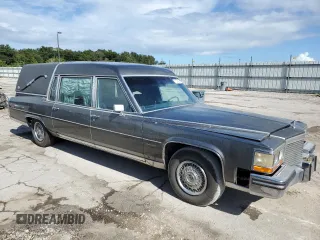 1988 Cadillac Brougham z VIN 1G6DW51Y2J9714052, wystawiony jako Copart lot #77274064 z przebiegiem 69 106 mil mil oraz Szkody całkowita. Historia ofert i sprzedaży dostępna na DreamBid. Obrazek 4.