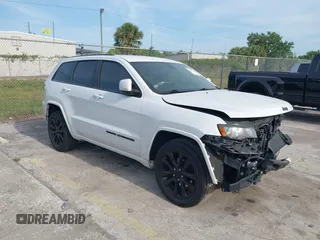 2017 Jeep Grand Cherokee Altitude with VIN 1C4RJEAG1HC915852, listed as a IAAI auction lot 42067259 with 128,351 mi miles and . Bid and sale history available at DreamBid. Image 1.