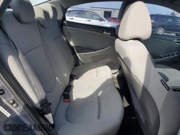 2012 Hyundai Accent GLS z VIN KMHCU4AE4CU185892, wystawiony jako Copart lot #52803675 z przebiegiem 168 792 mil mil oraz Szkoda całkowita • Salvage title. Historia ofert i sprzedaży dostępna na DreamBid. Obrazek 10.