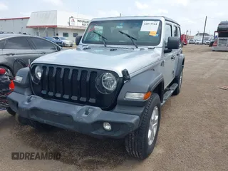 2022 Jeep Wrangler Unlimited Willys Sport with VIN 1C4HJXDM4NW175782, listed as a IAAI auction lot 42073544 with 129,299 mi miles and . Bid and sale history available at DreamBid. Image 6.