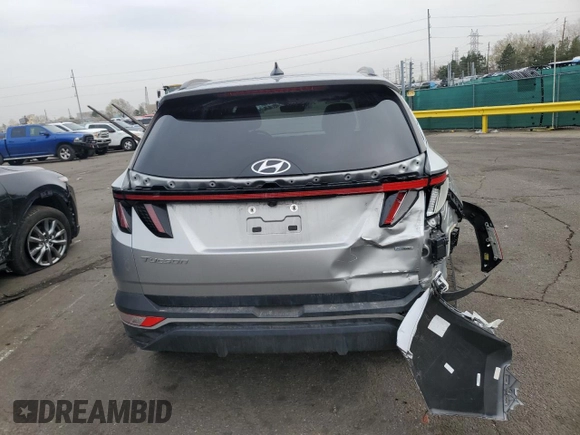 2022 Hyundai Tucson SEL with VIN 5NMJCCAE1NH034754, listed as a Copart auction lot 51097675 with 53,057 mi miles and Salvage Title. Bid and sale history available at carsss.com. Image 6.