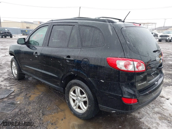 2012 Hyundai Santa Fe GLS with VIN 5XYZG3ABXCG159336, listed as a IAAI auction lot 41635699 with 128,975 mi miles. Bid and sale history available at carsss.com. Image 3.
