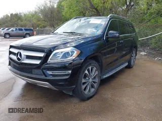 2013 Mercedes-Benz GL-Class GL 450 with VIN 4JGDF7CE4DA237229, listed as a IAAI auction lot 41912216 with 144,333 mi miles. Bid and sale history available at carsss.com. Image 2.