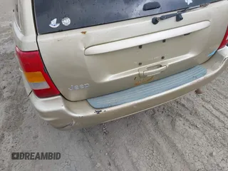 1999 Jeep Grand Cherokee Limited with VIN 1J4GW68SXXC664055, listed as a IAAI auction lot 42339125 with 219,792 mi miles and . Bid and sale history available at DreamBid. Image 16.