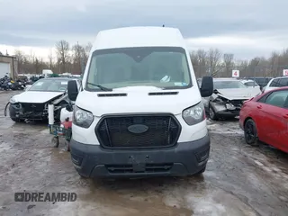 2023 Ford Transit Cargo with VIN 1FTBR3U80PKA40125, listed as a IAAI auction lot 41709473 with 83,626 mi miles and . Bid and sale history available at DreamBid. Image 12.