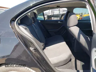 2014 Volkswagen Jetta S z VIN 3VW2K7AJ9EM207135, wystawiony jako IAAI lot #42316176 z przebiegiem 237 752 mil mil oraz . Historia ofert i sprzedaży dostępna na DreamBid. Obrazek 8.