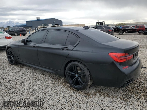 2018 BMW 7 Series 750i with VIN WBA7F0C55JGM23537, listed as a Copart auction lot 76824074 with 64,682 mi miles and Salvage Title. Bid and sale history available at carsss.com. Image 2.