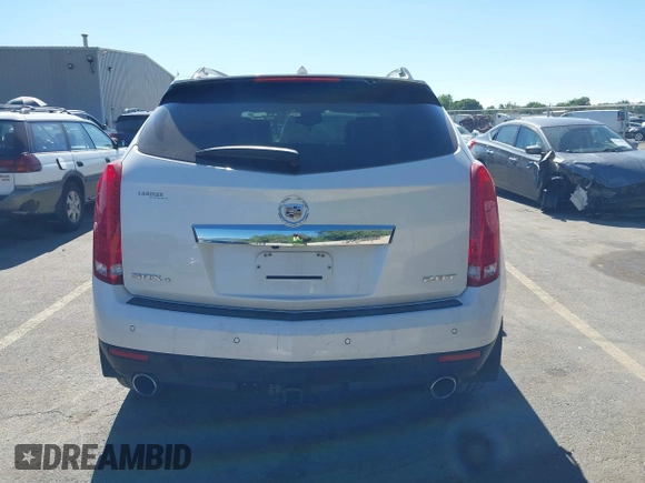 2011 Cadillac SRX Turbo Premium Collection with VIN 3GYFNKE68BS532056, listed as a IAAI auction lot 42447059 with 104,969 mi miles and . Bid and sale history available at DreamBid. Image 16.