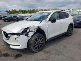 2018 Mazda CX-5 Grand Touring z VIN JM3KFBDM6J0447165, wystawiony jako Copart lot #56133015 z przebiegiem 80 579 mil mil oraz Szkoda całkowita • Salvage title. Historia ofert i sprzedaży dostępna na DreamBid. Obrazek 1.