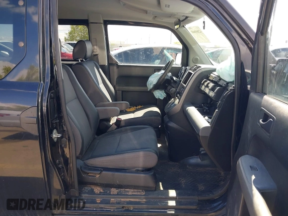 2005 Honda Element EX with VIN 5J6YH28665L034380, listed as a IAAI auction lot 42060660 with 230,486 mi miles and . Bid and sale history available at DreamBid. Image 4.