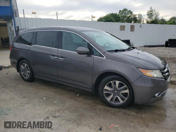 2015 Honda Odyssey Touring Elite with VIN 5FNRL5H95FB117985, listed as a Copart auction lot 57178695 with 199,757 mi miles and Non repairable. Bid and sale history available at DreamBid. Image 4.