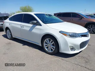 2014 Toyota Avalon Limited z VIN 4T1BK1EB5EU101243, wystawiony jako IAAI lot #42401159 z przebiegiem 91 916 mil mil oraz . Historia ofert i sprzedaży dostępna na DreamBid. Obrazek 1.