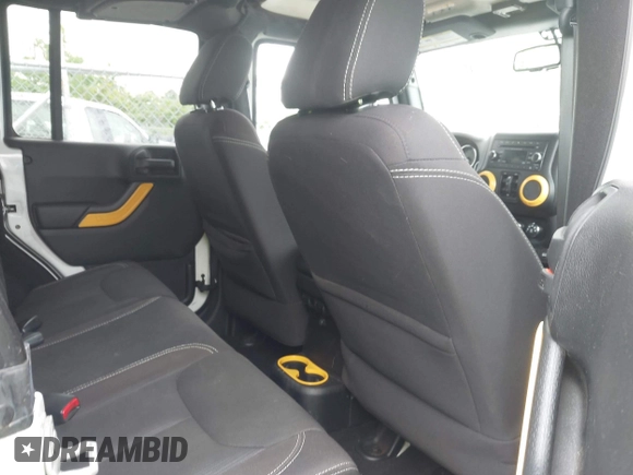 2015 Jeep Wrangler Unlimited Sahara с VIN 1C4BJWEG1FL506393, выставлен на аукционе IAAI как лот 42326900 с пробегом 100 538 миль миль и . История ставок и продаж доступна на DreamBid. Изображение 8.