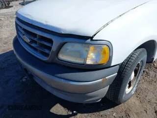 2002 Ford F-150 XL with VIN 1FTRX17L72NA76720, listed as a IAAI auction lot 41738935 with 92,506 mi miles. Bid and sale history available at carsss.com. Image 14.