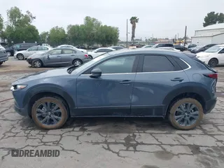 2022 Mazda CX-30 S Carbon Edition with VIN 3MVDMBCL0NM456154, listed as a IAAI auction lot 42153202 with 40,372 mi miles and . Bid and sale history available at DreamBid. Image 14.