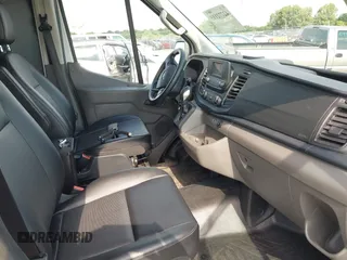 2023 Ford Transit z VIN 1FTBW9CG7PKB84159, wystawiony jako IAAI lot #42772115 z przebiegiem 6 945 mil mil oraz . Historia ofert i sprzedaży dostępna na DreamBid. Obrazek 5.