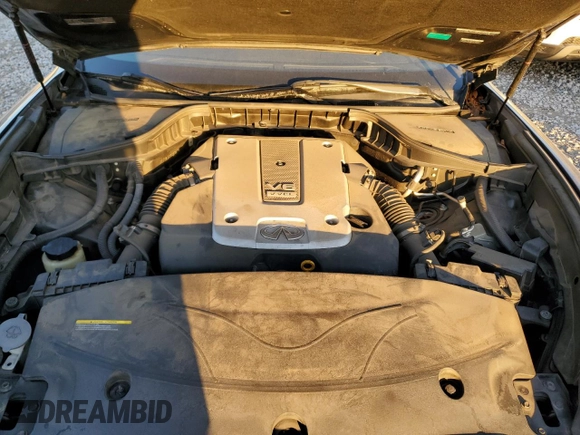 2015 Infiniti Q70 z VIN JN1BY1PR2FM830124, wystawiony jako Copart lot #42536205 z przebiegiem 138 498 mil mil oraz Szkoda całkowita • Salvage title. Historia ofert i sprzedaży dostępna na DreamBid. Obrazek 11.