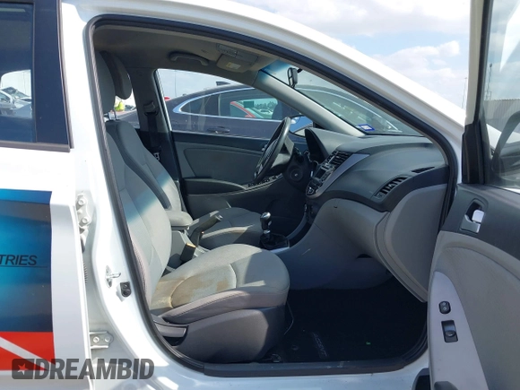 2015 Hyundai Accent Sport with VIN KMHCU5AE5FU201477, listed as a IAAI auction lot 41529347 with 189,774 mi miles. Bid and sale history available at carsss.com. Image 5.
