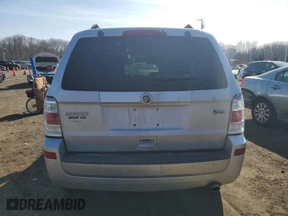 2010 Mercury Mariner с VIN 4M2CN9BG3AKJ24955, выставлен на аукционе Copart как лот 49281755 с пробегом 140 768 миль миль и Списание • Salvage title. История ставок и продаж доступна на DreamBid. Изображение 6.