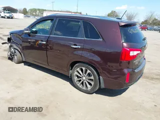 2014 Kia Sorento SX with VIN 5XYKW4A73EG458059, listed as a IAAI auction lot 41860159 with 140,644 mi miles. Bid and sale history available at carsss.com. Image 3.