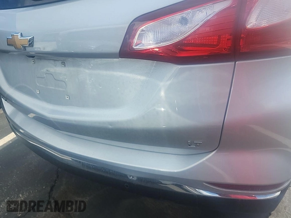 2020 Chevrolet Equinox LT z VIN 2GNAXJEV0L6231512, wystawiony jako IAAI lot #42516878 z przebiegiem 67 453 mil mil oraz . Historia ofert i sprzedaży dostępna na DreamBid. Obrazek 30.