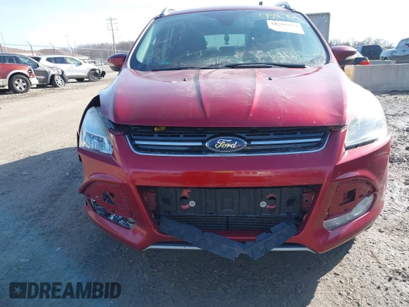 2015 Ford Escape Titanium z VIN 1FMCU9J9XFUC75357, wystawiony jako IAAI lot #41705474 z przebiegiem 198 381 mil mil oraz . Historia ofert i sprzedaży dostępna na DreamBid. Obrazek 12.
