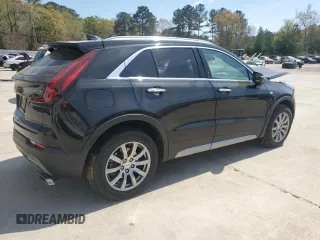 2021 Cadillac XT4 FWD Premium Luxury z VIN 1GYFZCR48MF002468, wystawiony jako Copart lot #50878955 z przebiegiem 76 034 mil mil oraz Szkoda całkowita • Salvage title. Historia ofert i sprzedaży dostępna na DreamBid. Obrazek 3.