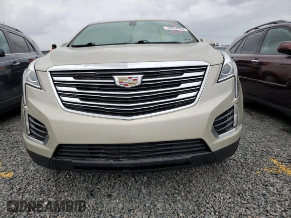 2017 Cadillac XT5 FWD с VIN 1GYKNARS4HZ176328, выставлен на аукционе Copart как лот 58874135 с пробегом Не указан миль и На запчасти • Non repairable. История ставок и продаж доступна на DreamBid. Изображение 5.